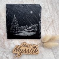 Gegraveerde leisteen met kerstlandschap