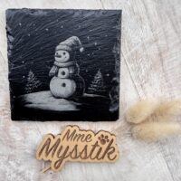 Gegraveerde leisteen met sneeuwmannetje
